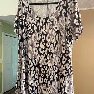 Women’s BM Brand very nice shirt with shark bite.